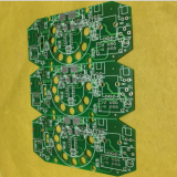 The varistor and solder pads are white in the PCBA design